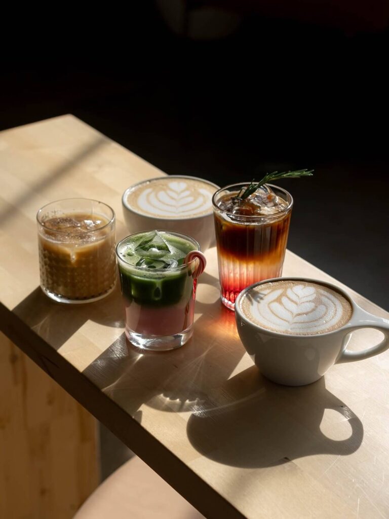 Signature specialty coffee drinks at Coalescence Coffee including lattes cold brew and matcha